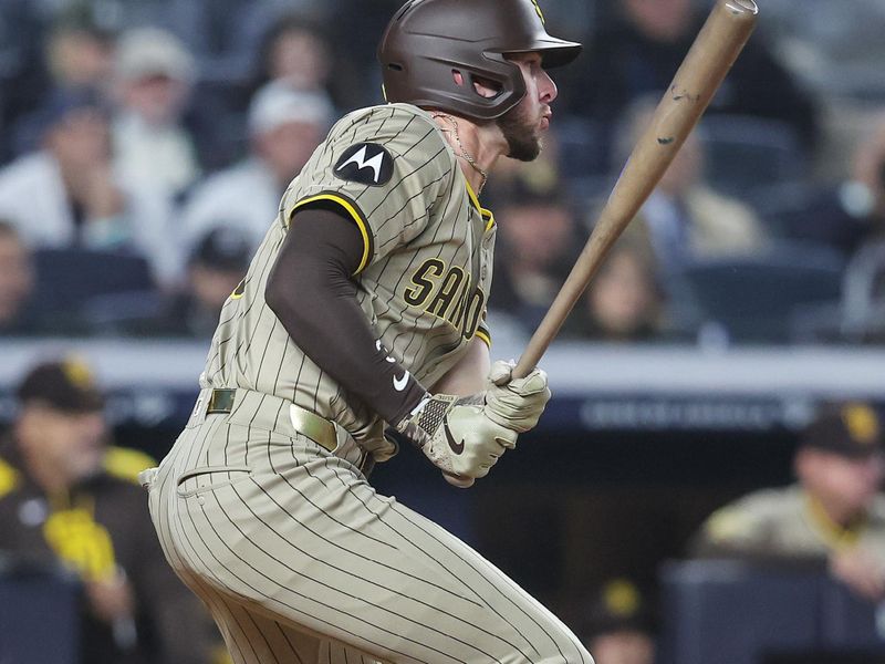 May 6, 2025; Bronx, New York, USA;  San Diego Padres center fielder Jackson Merrill (3) hits a single in the fourth inning against the New York Yankees at Yankee Stadium. Mandatory Credit: Wendell Cruz-Imagn Images