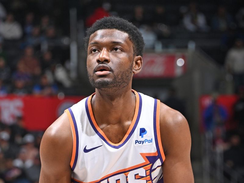 LOS ANGELES, CA - JANUARY 8: Chimezie Metu #4 of the Phoenix Suns shoots a free throw during the game against the LA Clippers on January 8, 2024 at Crypto.Com Arena in Los Angeles, California. NOTE TO USER: User expressly acknowledges and agrees that, by downloading and/or using this Photograph, user is consenting to the terms and conditions of the Getty Images License Agreement. Mandatory Copyright Notice: Copyright 2024 NBAE (Photo by Andrew D. Bernstein/NBAE via Getty Images)