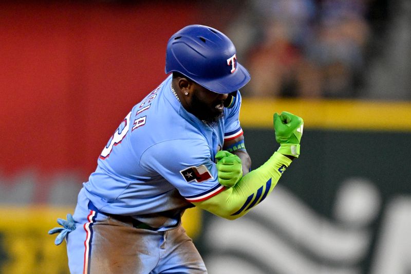 Aug 24, 2025; Arlington, Texas, USA; Texas Rangers right fielder Adolis Garcia (53) celebrates after he hits a double against the Cleveland Guardians during the sixth inning at Globe Life Field. Mandatory Credit: Jerome Miron-Imagn Images