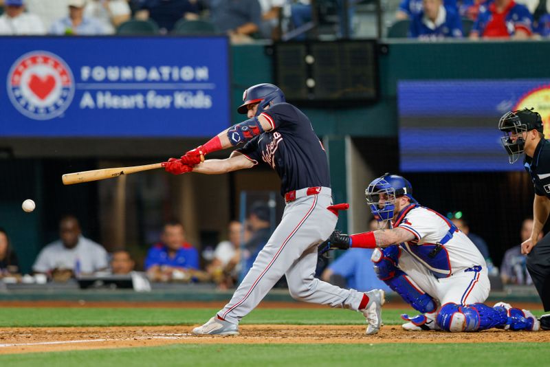 May 1, 2024; Arlington, Texas, USA; Washington Nationals outfielder Jacob Young (30) singles to third base during the eighth inning against the Texas Rangers at Globe Life Field. Mandatory Credit: Andrew Dieb-USA TODAY Sports