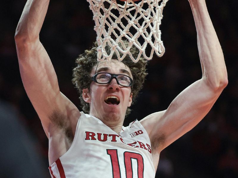 Nov 10, 2023; Piscataway, New Jersey, USA; Rutgers Scarlet Knights guard Gavin Griffiths (10) dunks the ball during the second half against the Boston University Terriers at Jersey Mike's Arena. Mandatory Credit: Vincent Carchietta-USA TODAY Sports