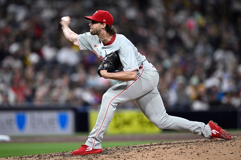 Apr 26, 2024; San Diego, California, USA; Philadelphia Phillies starting pitcher Aaron Nola (27) throws a pitch against the San Diego Padres during the fifth inning at Petco Park. Mandatory Credit: Orlando Ramirez-USA TODAY Sports