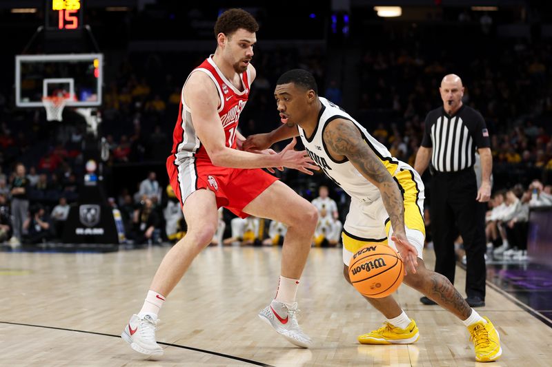 Mar 14, 2024; Minneapolis, MN, USA; Iowa Hawkeyes guard Tony Perkins (11) dribbles around Ohio State Buckeyes forward Jamison Battle (10) during the first half at Target Center. Mandatory Credit: Matt Krohn-USA TODAY Sports