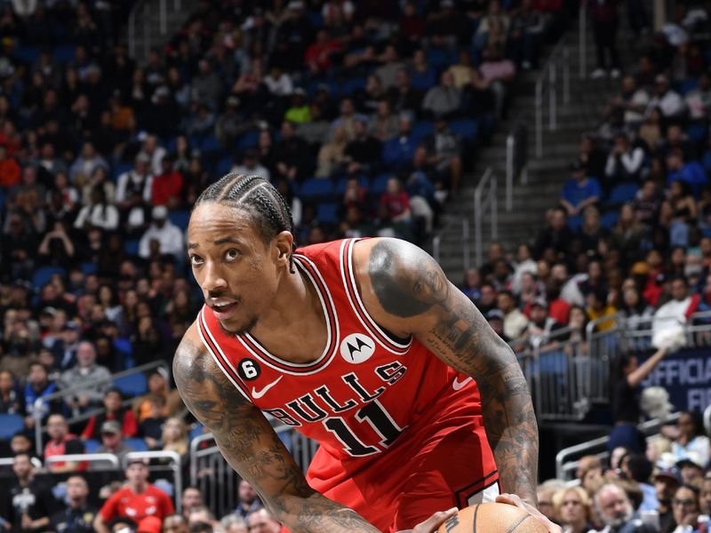 ORLANDO, FL - JANUARY 28: DeMar DeRozan #11 of the Chicago Bulls handles the ball during the game against the Orlando Magic on January 28, 2023 at Amway Center in Orlando, Florida. NOTE TO USER: User expressly acknowledges and agrees that, by downloading and or using this photograph, User is consenting to the terms and conditions of the Getty Images License Agreement. Mandatory Copyright Notice: Copyright 2023 NBAE (Photo by Fernando Medina/NBAE via Getty Images)