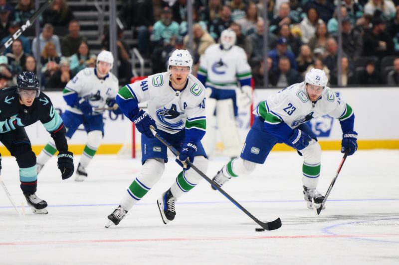 Feb 22, 2024; Seattle, Washington, USA; Vancouver Canucks center Elias Pettersson (40) advances the puck against the Seattle Kraken during the third period at Climate Pledge Arena. Mandatory Credit: Steven Bisig-USA TODAY Sports