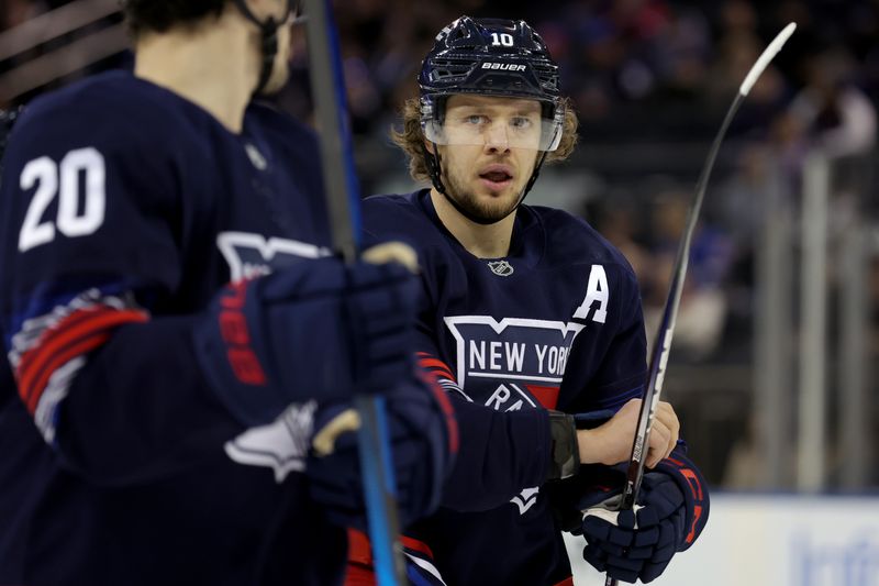 Dec 6, 2024; New York, New York, USA; New York Rangers left wing Artemi Panarin (10) talks to left wing Chris Kreider (20) during the third period against the Pittsburgh Penguins at Madison Square Garden. Mandatory Credit: Brad Penner-Imagn Images