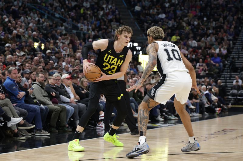 SALT LAKE CITY, UT - MARCH 27: Lauri Markkanen #23 of the Utah Jazz looks to pass the ball during the game against the San Antonio Spurs on March 27, 2024 at Delta Center in Salt Lake City, Utah. NOTE TO USER: User expressly acknowledges and agrees that, by downloading and or using this Photograph, User is consenting to the terms and conditions of the Getty Images License Agreement. Mandatory Copyright Notice: Copyright 2024 NBAE (Photo by Chris Nicoll/NBAE via Getty Images)