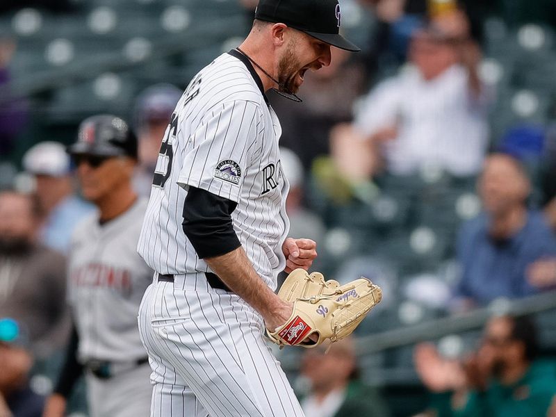 Apr 10, 2024; Denver, Colorado, USA; Colorado Rockies starting pitcher Austin Gomber (26) reacts after an out in the sixth inning against the Arizona Diamondbacks at Coors Field. Mandatory Credit: Isaiah J. Downing-USA TODAY Sports