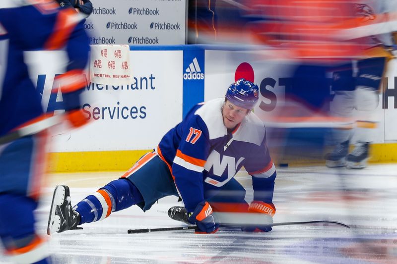 Apr 6, 2024; Elmont, New York, USA; New York Islanders left wing Matt Martin (17) stretches prior to the game during warmups against Nashville Predators at UBS Arena. Mandatory Credit: Tom Horak-USA TODAY Sports