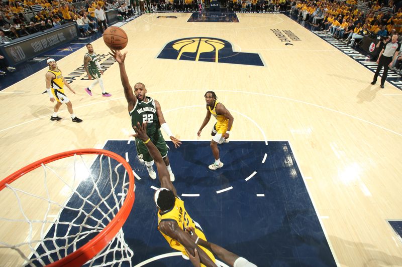 INDIANAPOLIS, IN - APRIL 26: Khris Middleton #22 of the Milwaukee Bucks drives to the basket during the game against the Indiana Pacers during Round 1 Game 3 of the 2024 NBA Playoffs on April 26, 2024 at Gainbridge Fieldhouse in Indianapolis, Indiana. NOTE TO USER: User expressly acknowledges and agrees that, by downloading and or using this Photograph, user is consenting to the terms and conditions of the Getty Images License Agreement. Mandatory Copyright Notice: Copyright 2023 NBAE (Photo by Nathaniel S. Butler/NBAE via Getty Images)