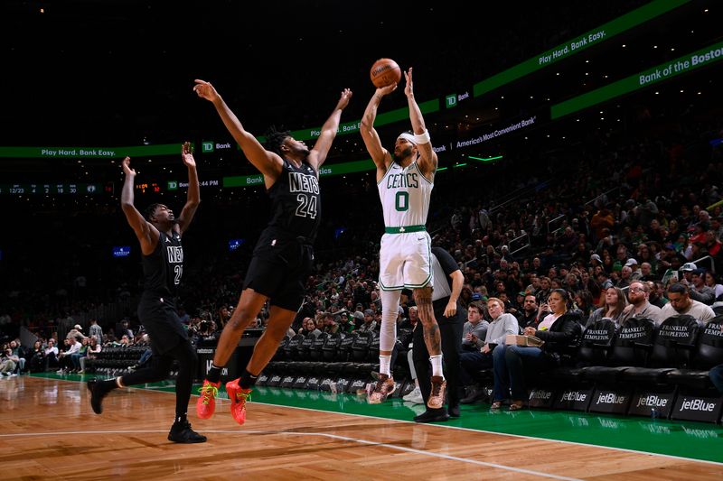 BOSTON, MA - FEBRUARY 14: Jayson Tatum #0 of the Boston Celtics shoots a three point basket during the game against the Brooklyn Nets on February 14, 2024 at the TD Garden in Boston, Massachusetts. NOTE TO USER: User expressly acknowledges and agrees that, by downloading and or using this photograph, User is consenting to the terms and conditions of the Getty Images License Agreement. Mandatory Copyright Notice: Copyright 2024 NBAE  (Photo by Brian Babineau/NBAE via Getty Images)