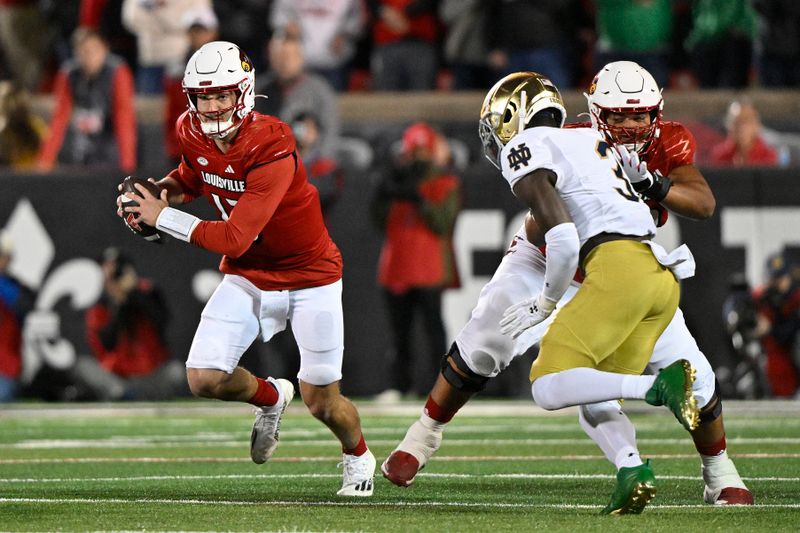 Oct 7, 2023; Louisville, Kentucky, USA; Louisville Cardinals quarterback Jack Plummer (13) runs the ball against Notre Dame Fighting Irish linebacker Jaylen Sneed (3) during the first half at L&N Federal Credit Union Stadium. Louisville defeated Notre Dame 33-20. Mandatory Credit: Jamie Rhodes-USA TODAY Sports