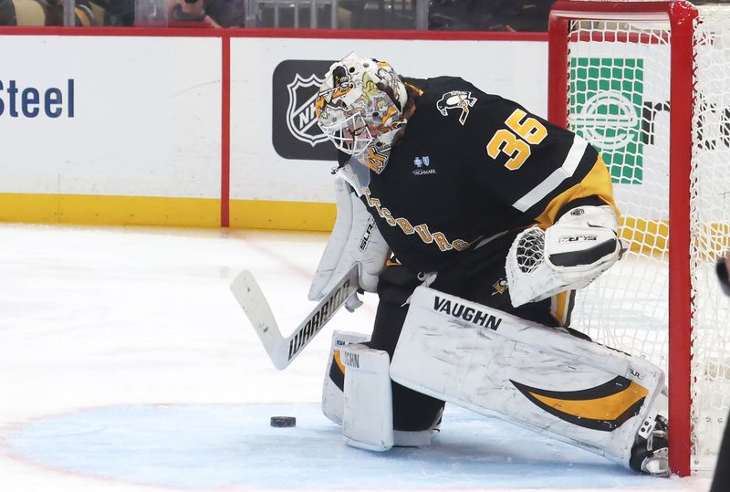 Mar 11, 2025; Pittsburgh, Pennsylvania, USA;  Pittsburgh Penguins goaltender Tristan Jarry (35) makes a save against the Vegas Golden Knights during the second period at PPG Paints Arena. Mandatory Credit: Charles LeClaire-Imagn Images