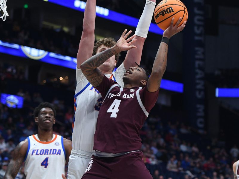 Mar 16, 2024; Nashville, TN, USA; Texas A&M Aggies guard Wade Taylor IV (4) attempts a shot against Florida Gators center Micah Handlogten (3) during the second half at Bridgestone Arena. Mandatory Credit: Christopher Hanewinckel-USA TODAY Sports