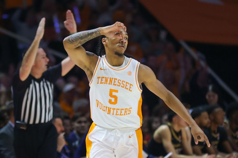 Feb 17, 2024; Knoxville, Tennessee, USA; Tennessee Volunteers guard Zakai Zeigler (5) reacts after shooting for three points against the Vanderbilt Commodores during the first half at Thompson-Boling Arena at Food City Center. Mandatory Credit: Randy Sartin-USA TODAY Sports