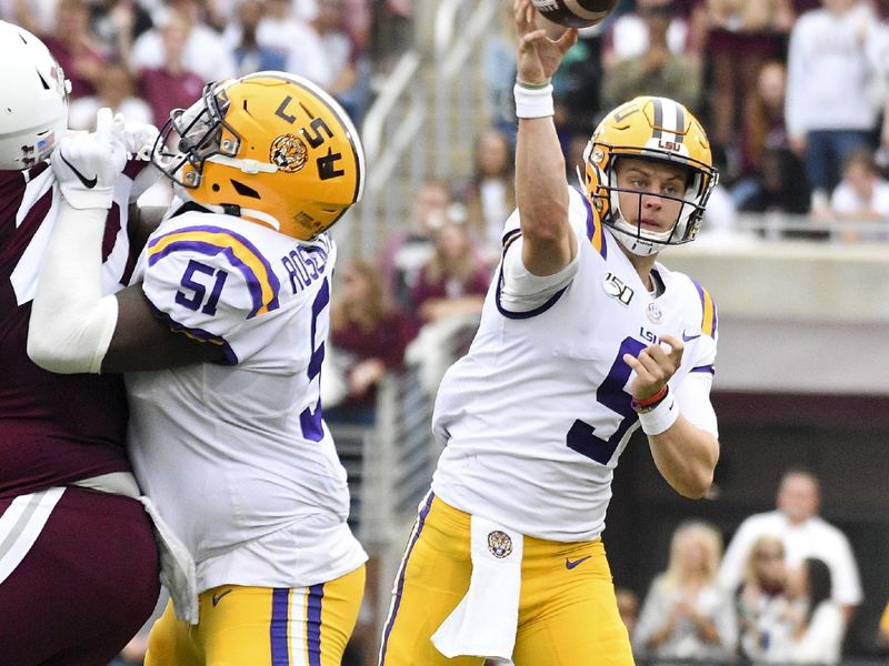 Oct 19, 2019; Starkville, MS, USA; Louisiana State Tigers  quarterback Joe Burrow (9) make a pass against the Mississippi State Bulldogs during the second quarter at Davis Wade Stadium. Mandatory Credit: Matt Bush-USA TODAY Sports