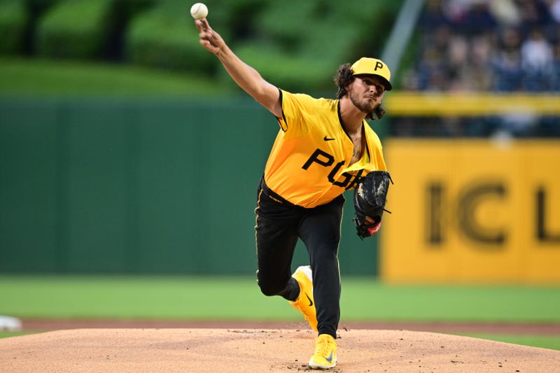 May 10, 2024; Pittsburgh, Pennsylvania, USA; Pittsburgh Pirates starting pitcher Jared Jones (37) throws a pitch in the first inning against the Chicago Cubs at PNC Park. Mandatory Credit: David Dermer-USA TODAY Sports