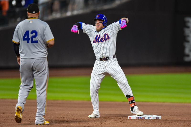 Apr 15, 2024; New York City, New York, USA; New York Mets outfielder Harrison Bader reacts after hitting a two RBI double against the Pittsburgh Pirates during the eighth inning at Citi Field. Mandatory Credit: John Jones-USA TODAY Sports