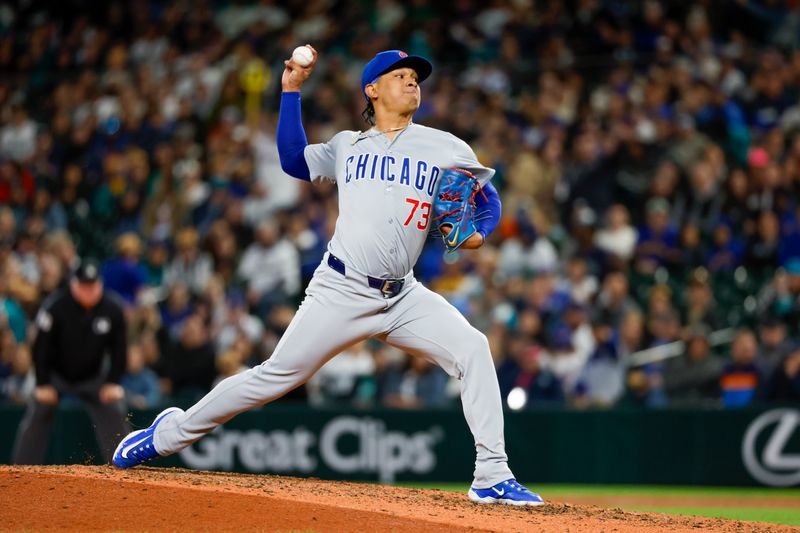 Apr 13, 2024; Seattle, Washington, USA; Chicago Cubs relief pitcher Adbert Alzolay (73) throws against the Seattle Mariners during the ninth inning at T-Mobile Park. Mandatory Credit: Joe Nicholson-USA TODAY Sports