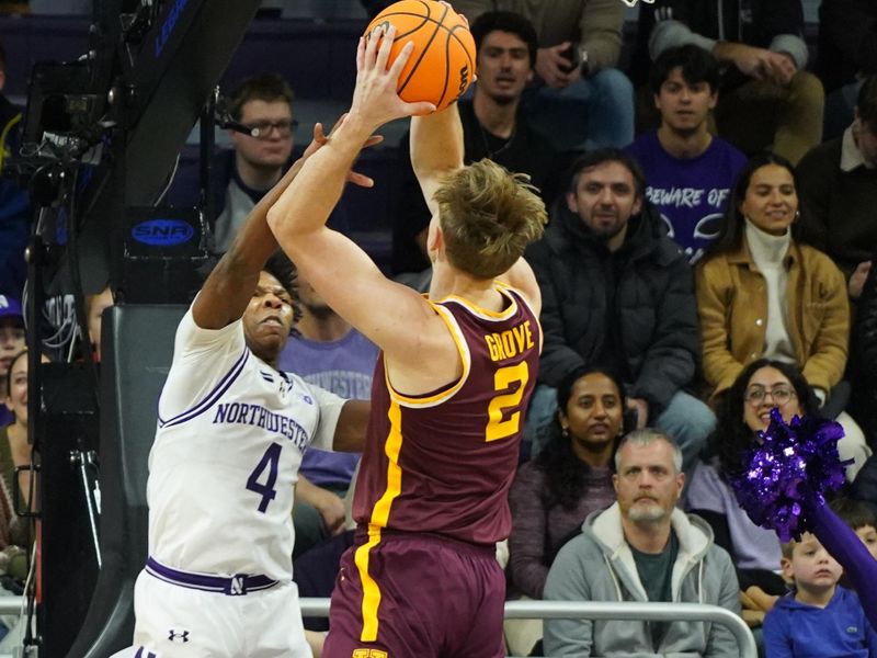 Jan 3, 2026; Evanston, Illinois, USA; Northwestern Wildcats guard Jayden Reid (4) defends Minnesota Golden Gophers forward Grayson Grove (2) during the first half at Welsh-Ryan Arena. Mandatory Credit: David Banks-Imagn Images