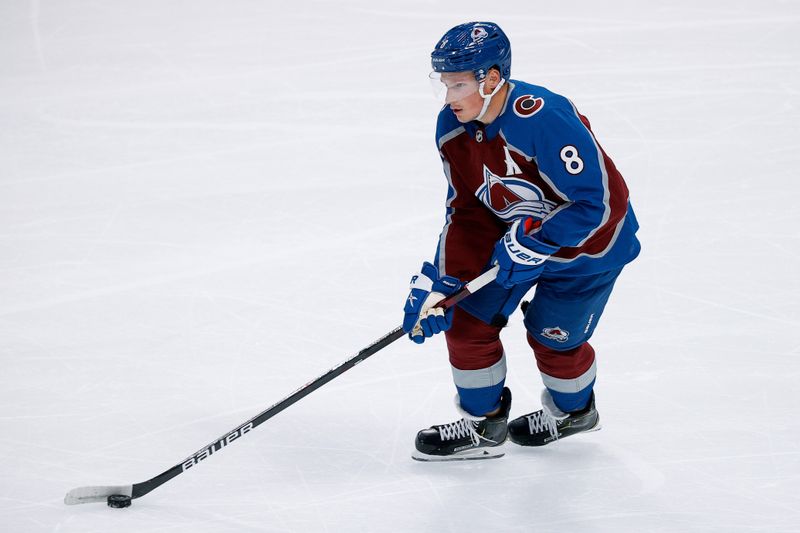 Oct 5, 2022; Denver, Colorado, USA; Colorado Avalanche defenseman Cale Makar (8) controls the puck in the first period against the Dallas Stars at Ball Arena. Mandatory Credit: Isaiah J. Downing-USA TODAY Sports