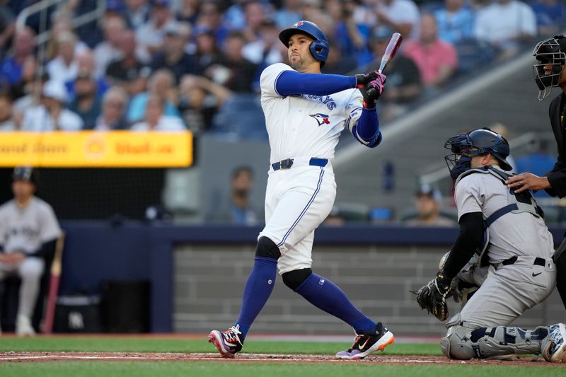 Jun 27, 2024; Toronto, Ontario, CAN; Toronto Blue Jays right fielder George Springer (4) hits a three-run home run against the New York Yankees during the first inning at Rogers Centre. Mandatory Credit: John E. Sokolowski-USA TODAY Sports