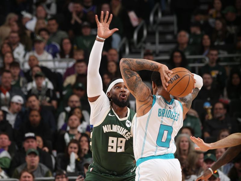 MILWAUKEE, WI - FEBRUARY 9: Jae Crowder #99 of the Milwaukee Bucks plays defense during the game against the Charlotte Hornets on February 9, 2024 at the Fiserv Forum Center in Milwaukee, Wisconsin. NOTE TO USER: User expressly acknowledges and agrees that, by downloading and or using this Photograph, user is consenting to the terms and conditions of the Getty Images License Agreement. Mandatory Copyright Notice: Copyright 2024 NBAE (Photo by Gary Dineen/NBAE via Getty Images).