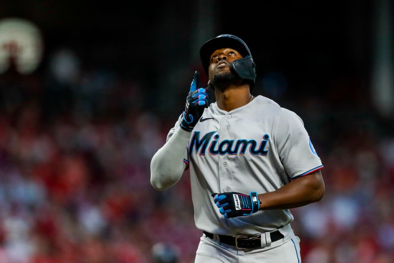 Aug 8, 2023; Cincinnati, Ohio, USA; Miami Marlins designated hitter Jorge Soler (12) reacts after hitting a two-run home run in the seventh inning against the Cincinnati Reds at Great American Ball Park. Mandatory Credit: Katie Stratman-USA TODAY Sports