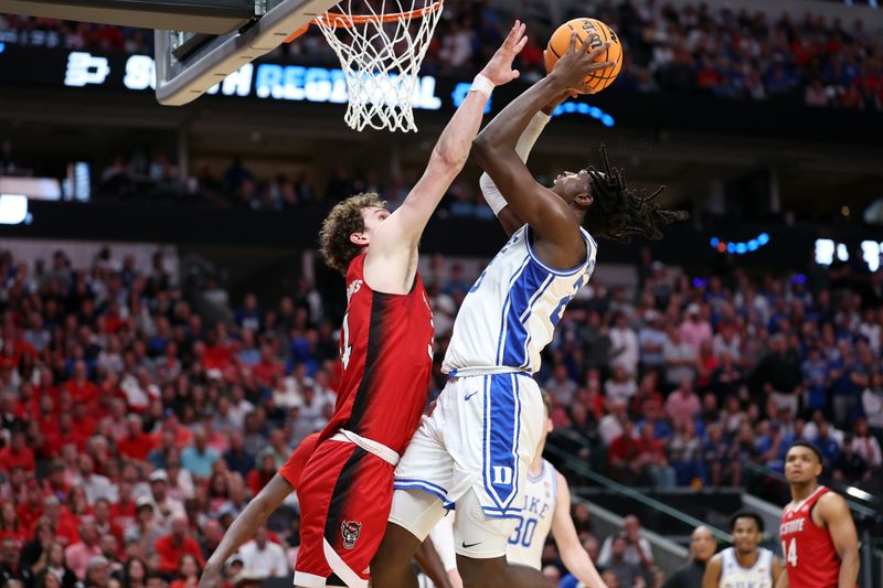 Mar 31, 2024; Dallas, TX, USA; Duke Blue Devils forward Mark Mitchell (25) shoots against North Carolina State Wolfpack forward Ben Middlebrooks (34) in the first half in the finals of the South Regional of the 2024 NCAA Tournament at American Airline Center. Mandatory Credit: Kevin Jairaj-USA TODAY Sports