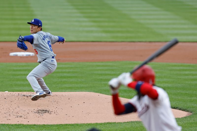 Apr 25, 2024; Washington, District of Columbia, USA; Los Angeles Dodgers starting pitcher Yoshinobu Yamamoto (18) pitches against Washington Nationals shortstop CJ Abrams (5) during the first inning at Nationals Park. Mandatory Credit: Geoff Burke-USA TODAY Sports