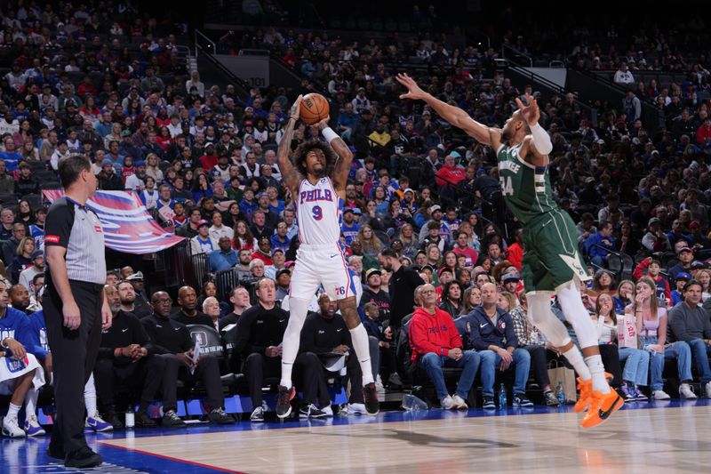 PHILADELPHIA, PA - FEBRUARY 25: Kelly Oubre Jr. #9 of the Philadelphia 76ers shoots a three point basket against the Milwaukee Bucks on February 25, 2024 at the Wells Fargo Center in Philadelphia, Pennsylvania NOTE TO USER: User expressly acknowledges and agrees that, by downloading and/or using this Photograph, user is consenting to the terms and conditions of the Getty Images License Agreement. Mandatory Copyright Notice: Copyright 2024 NBAE (Photo by Jesse D. Garrabrant/NBAE via Getty Images)