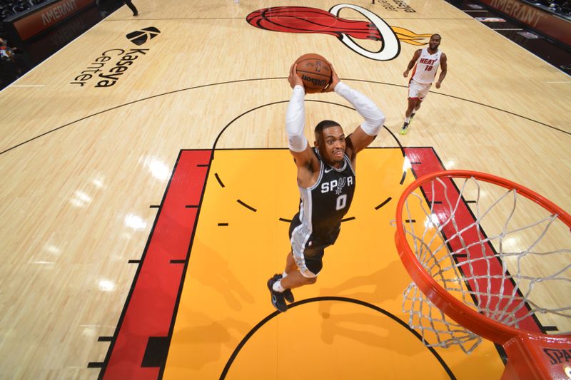 MIAMI, FL - OCTOBER 15: Keldon Johnson #0 of the San Antonio Spurs dunks the ball during the game against the Miami Heat during a NBA preseason game on October 15, 2024 at Kaseya Center in Miami, Florida. NOTE TO USER: User expressly acknowledges and agrees that, by downloading and or using this Photograph, user is consenting to the terms and conditions of the Getty Images License Agreement. Mandatory Copyright Notice: Copyright 2024 NBAE (Photo by Jesse D. Garrabrant/NBAE via Getty Images)