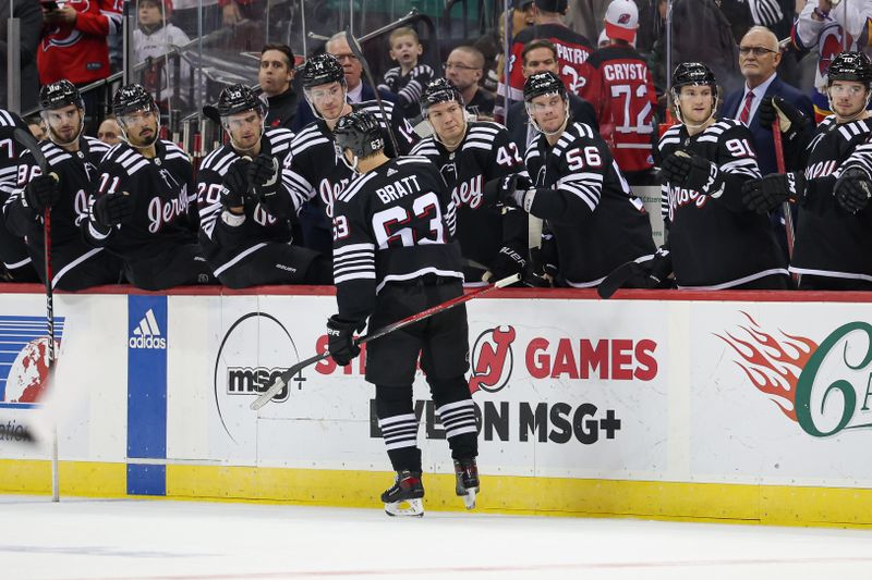 Oct 27, 2023; Newark, New Jersey, USA; New Jersey Devils left wing Jesper Bratt (63) celebrates his goal with teammates during the first period against the Buffalo Sabres at Prudential Center. Mandatory Credit: Vincent Carchietta-USA TODAY Sports