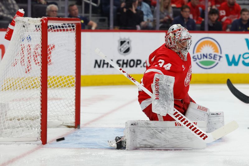 Apr 9, 2024; Detroit, Michigan, USA; Detroit Red Wings goaltender Alex Lyon (34) makes a save in the first period against the Washington Capitals at Little Caesars Arena. Mandatory Credit: Rick Osentoski-USA TODAY Sports