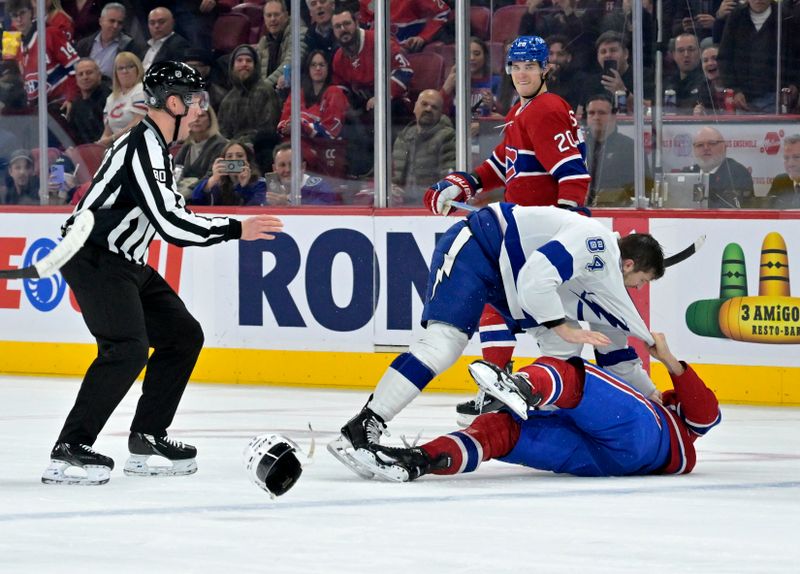 Nov 7, 2023; Montreal, Quebec, CAN; Tampa Bay Lightning forward Tanner Jeannot (84) fights Montreal Canadiens defenseman Arber Xhekaj (72) during the second period at the Bell Centre. Mandatory Credit: Eric Bolte-USA TODAY Sports