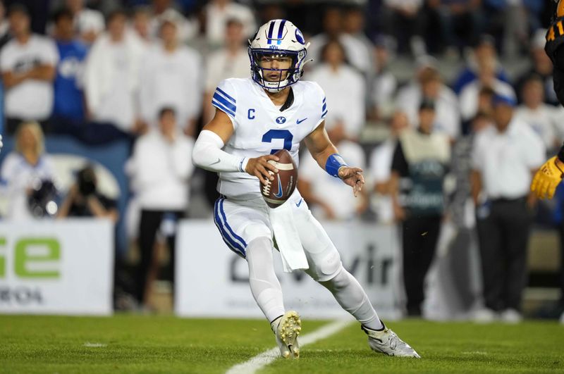 Sep 18, 2021; Provo, Utah, USA; BYU Cougars quarterback Jaren Hall (3) carries the ball in the first half against the Arizona State Sun Devils at LaVell Edwards Stadium. Mandatory Credit: Kirby Lee-USA TODAY Sports