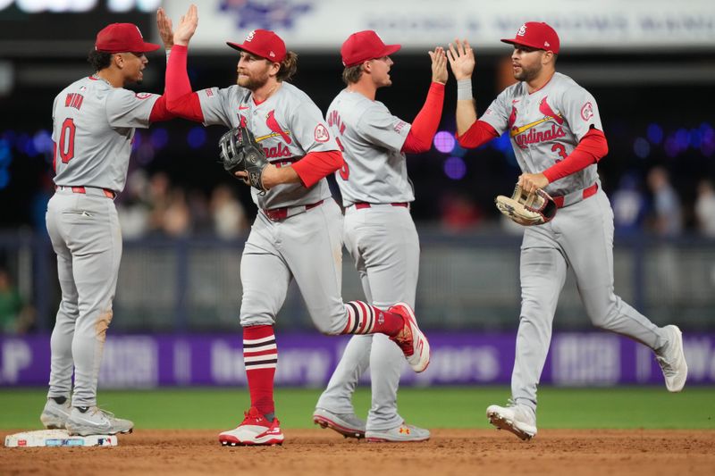 Jun 17, 2024; Miami, Florida, USA;  St. Louis Cardinals celebrate a victory against the Miami Marlins at loanDepot Park. Mandatory Credit: Jim Rassol-USA TODAY Sports