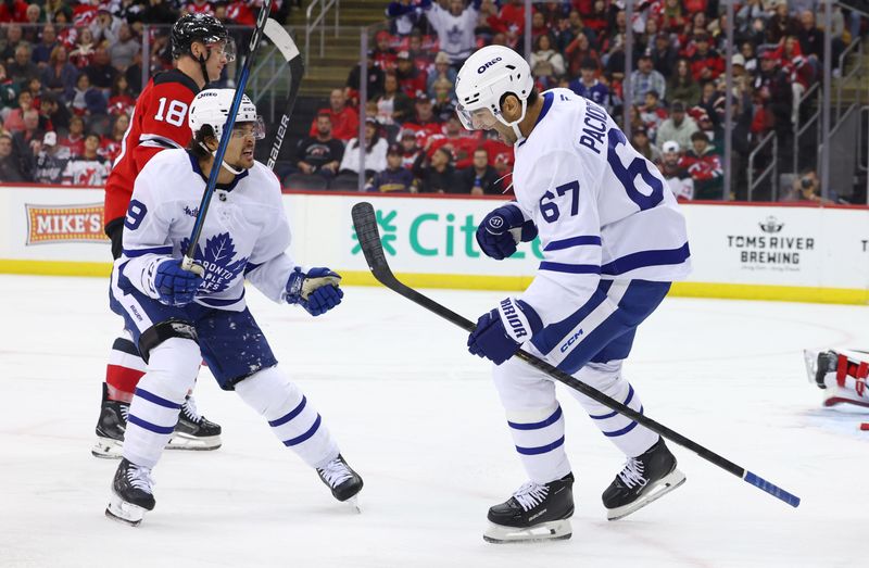 Oct 10, 2024; Newark, New Jersey, USA; Toronto Maple Leafs left wing Max Pacioretty (67) celebrates his goal against the New Jersey Devils during the first period at Prudential Center. Mandatory Credit: Ed Mulholland-Imagn Images