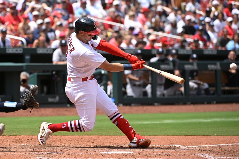 Jul 2, 2023; St. Louis, Missouri, USA; St. Louis Cardinals catcher Andrew Knizner (7) hits an RBI single against the New York Yankees in the fourth inning at Busch Stadium. Mandatory Credit: Joe Puetz-USA TODAY Sports