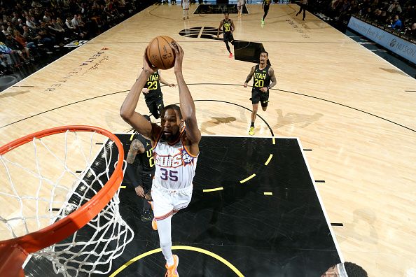 SALT LAKE CITY, UT - NOVEMBER 19: Kevin Durant #35 of the Phoenix Suns drives to the basket during the game against the Utah Jazz on November 19, 2023 at Delta Center in Salt Lake City, Utah. NOTE TO USER: User expressly acknowledges and agrees that, by downloading and or using this Photograph, User is consenting to the terms and conditions of the Getty Images License Agreement. Mandatory Copyright Notice: Copyright 2023 NBAE (Photo by Melissa Majchrzak/NBAE via Getty Images)