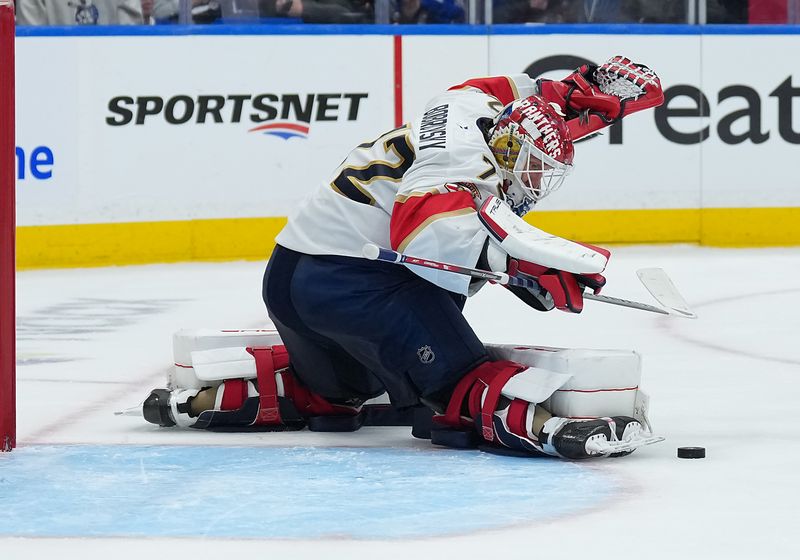 May 7, 2025; Toronto, Ontario, CAN; Florida Panthers goaltender Sergei Bobrovsky (72) stops the puck against the Toronto Maple Leafs during the third period in game two of the second round of the 2025 Stanley Cup Playoffs at Scotiabank Arena. Mandatory Credit: Nick Turchiaro-Imagn Images