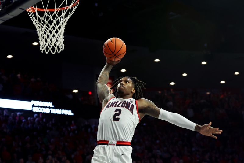 Dec 2, 2023; Tucson, Arizona, USA; Arizona Wildcats guard Caleb Love (2) dunks the ball against the Colgate Raiders during the second half at McKale Center. Mandatory Credit: Zachary BonDurant-USA TODAY Sports