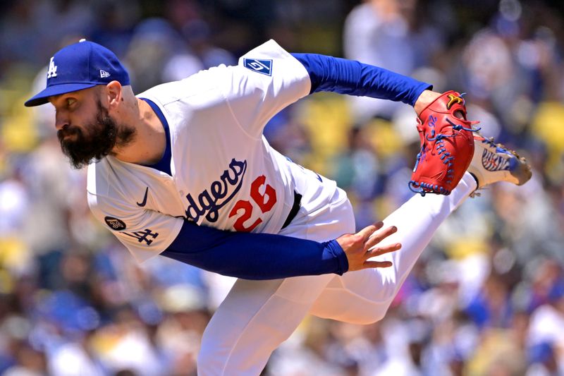 Apr 30, 2025; Los Angeles, California, USA;  Los Angeles Dodgers starting pitcher Tony Gonsolin (26) delivers to the plate in the fourth inning against the Miami Marlins at Dodger Stadium. Mandatory Credit: Jayne Kamin-Oncea-Imagn Images