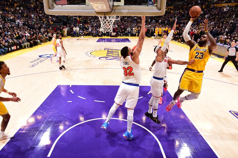 LOS ANGELES, CA - MARCH 6:  LeBron James #23 of the Los Angeles Lakers shoots the ball during the game against the New York Knicks on March 6, 2025 at Crypto.Com Arena in Los Angeles, California. NOTE TO USER: User expressly acknowledges and agrees that, by downloading and/or using this Photograph, user is consenting to the terms and conditions of the Getty Images License Agreement. Mandatory Copyright Notice: Copyright 2025 NBAE (Photo by Adam Pantozzi/NBAE via Getty Images)