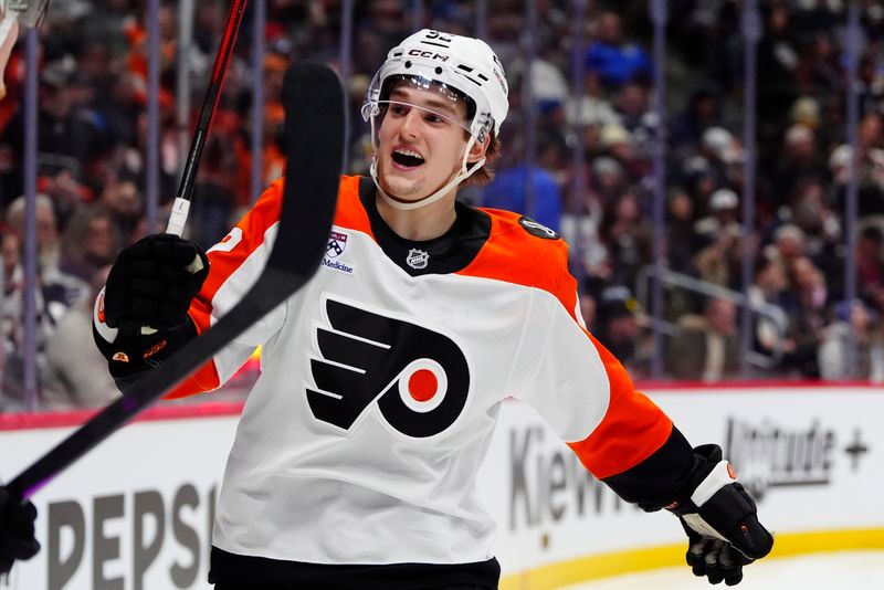 Jan 23, 2026; Denver, Colorado, USA; Philadelphia Flyers center Denver Barkey (52) celebrates his third period goal against the Colorado Avalanche at Ball Arena. Mandatory Credit: Ron Chenoy-Imagn Images