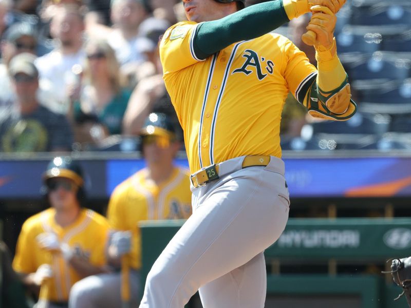 Sep 21, 2025; Pittsburgh, Pennsylvania, USA;  Athletics designated hitter Brent Rooker (25) hits a single against the Pittsburgh Pirates during the first inning at PNC Park. Mandatory Credit: Charles LeClaire-Imagn Images