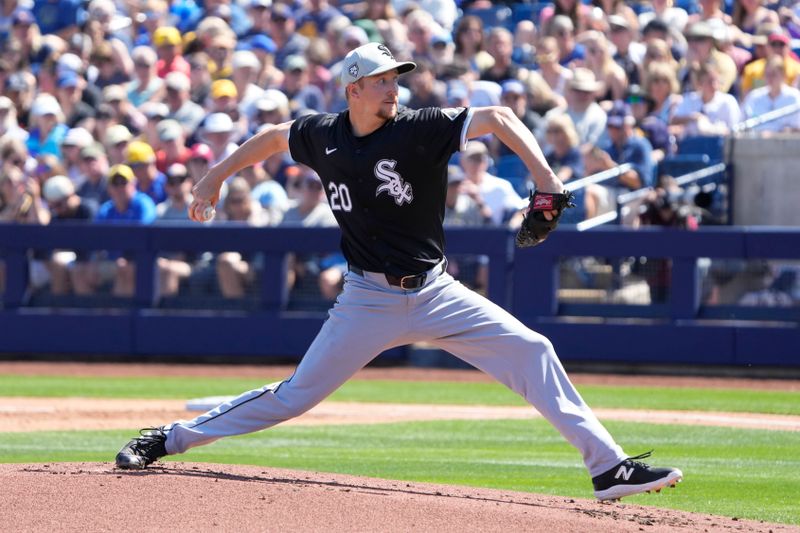 Mar 13, 2024; Phoenix, Arizona, USA; Chicago White Sox starting pitcher Erick Fedde (20) throws against the Milwaukee Brewers in the first inning at American Family Fields of Phoenix. Mandatory Credit: Rick Scuteri-USA TODAY Sports