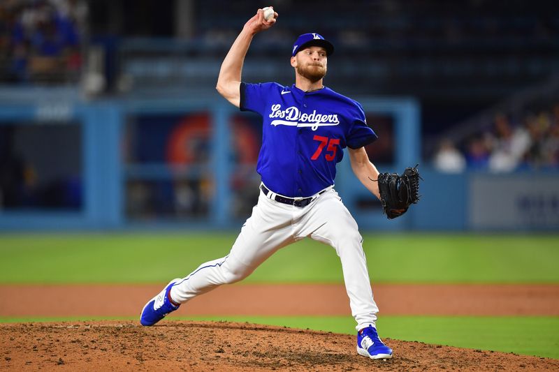 Jul 6, 2023; Los Angeles, California, USA; Los Angeles Dodgers relief pitcher Nick Robertson (75) throws against the Pittsburgh Pirates during the seventh inning at Dodger Stadium. Mandatory Credit: Gary A. Vasquez-USA TODAY Sports