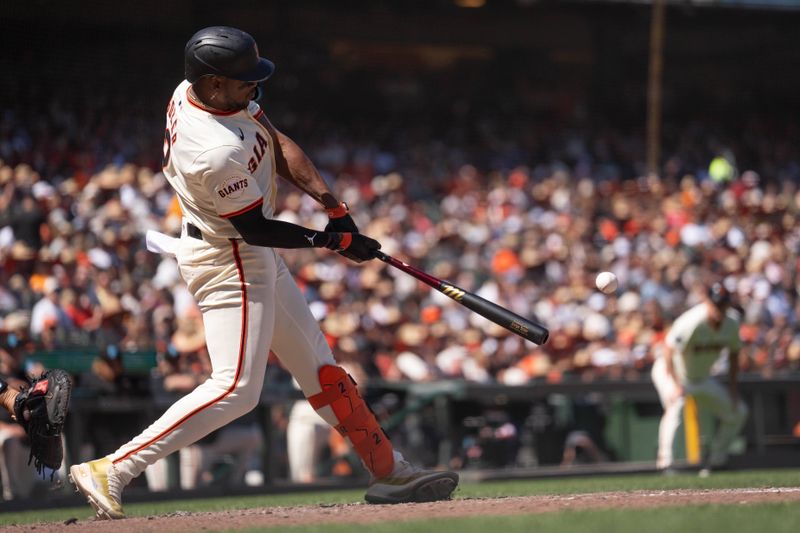 Jun 16, 2024; San Francisco, California, USA; San Francisco Giants designated hitter Jorge Soler (2) hits a double during the eighth inning against the Los Angeles Angels at Oracle Park. Mandatory Credit: Stan Szeto-USA TODAY Sports