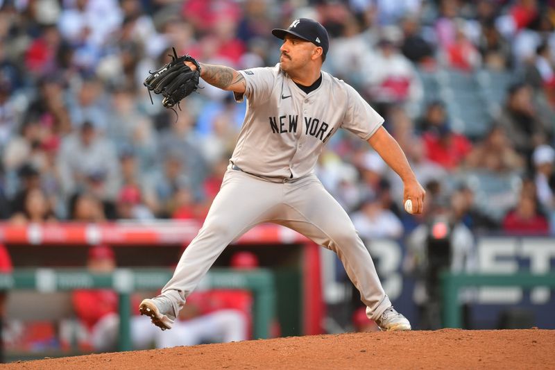 May 28, 2024; Anaheim, California, USA; New York Yankees pitcher Nestor Cortes (65) throws against the Los Angeles Angels during the second inning at Angel Stadium. Mandatory Credit: Gary A. Vasquez-USA TODAY Sports